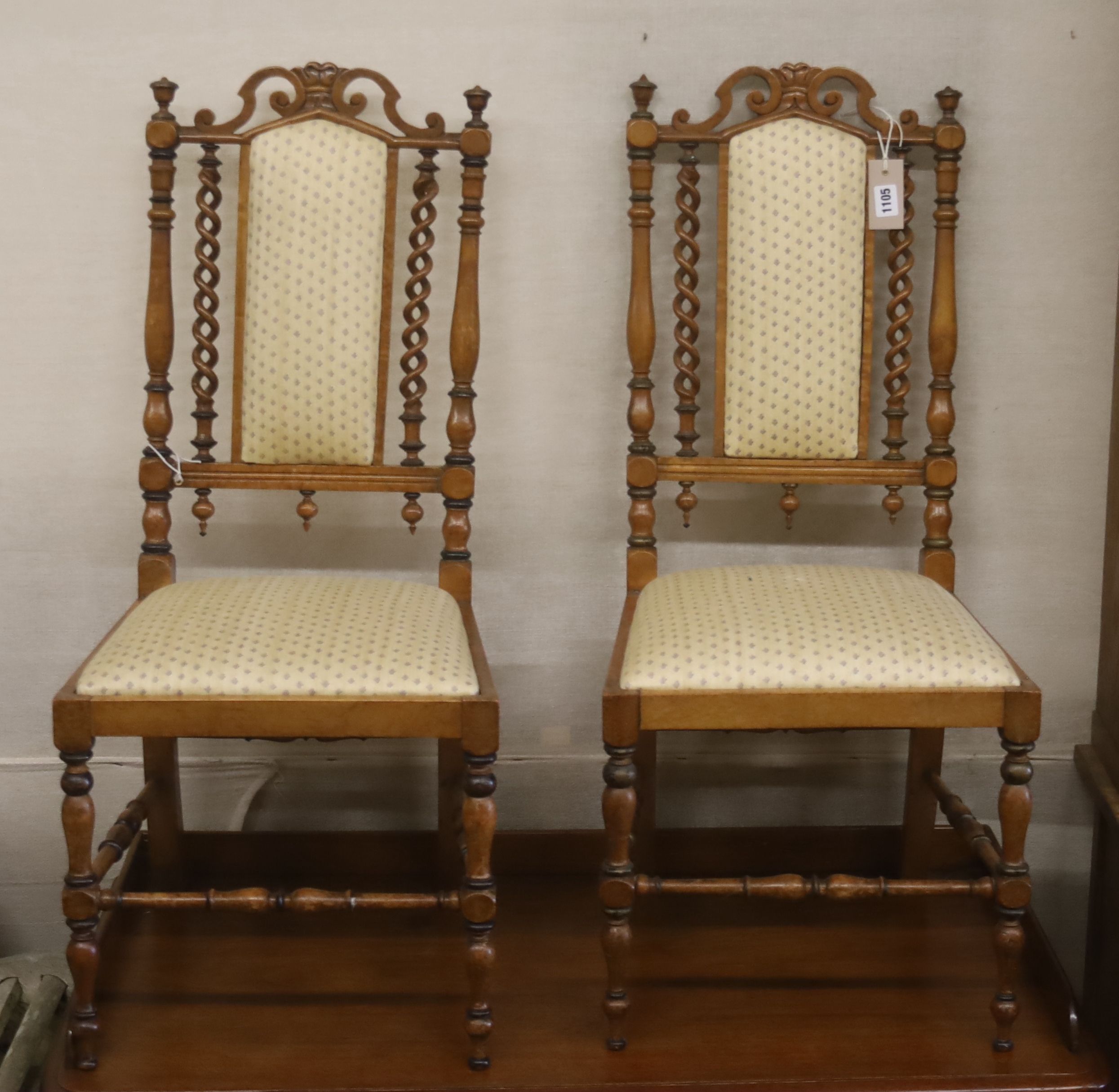 A pair of late Victorian turned walnut side chairs